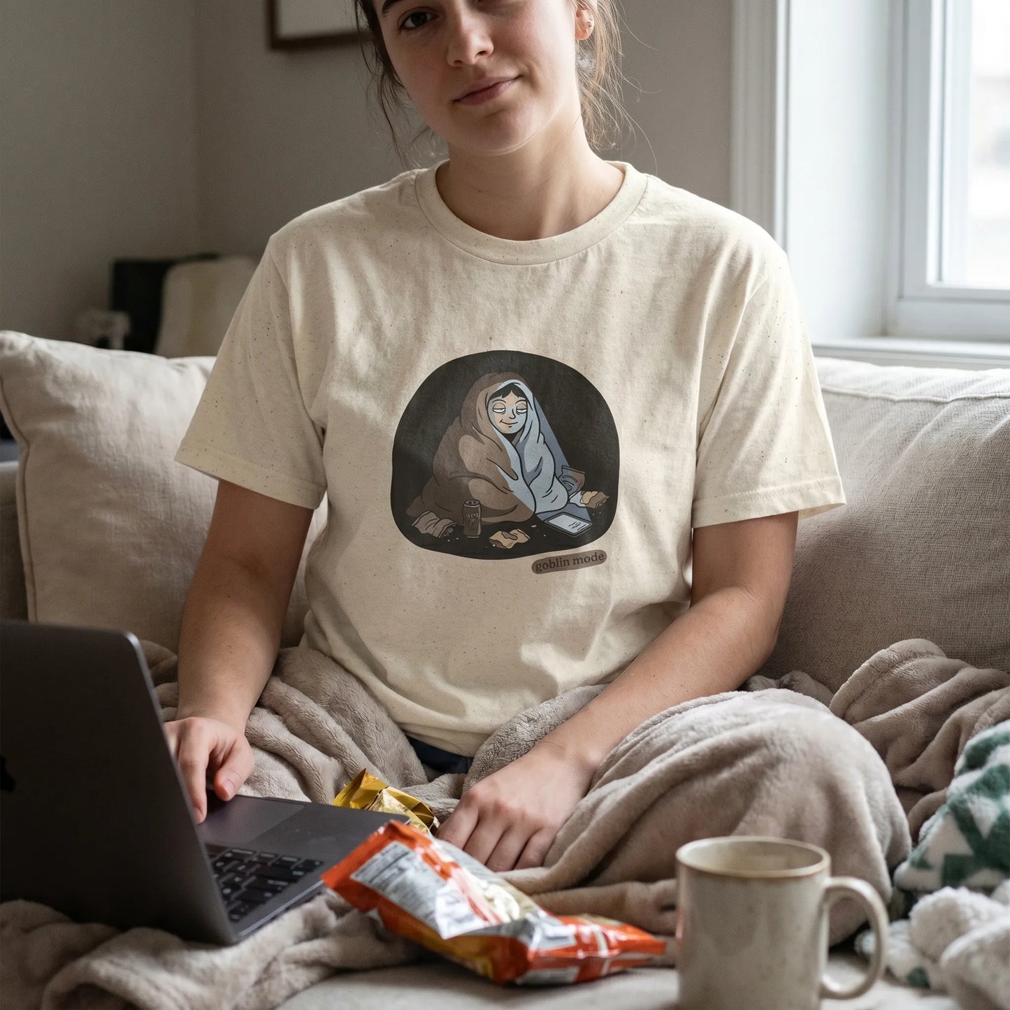 Lifestyle photo of a person wearing the Goblin Mode Tee, a funny cozy meme gift for the burnout friend featuring goblin energy and anti that girl vibes for lazy day humor while going goblin mode.