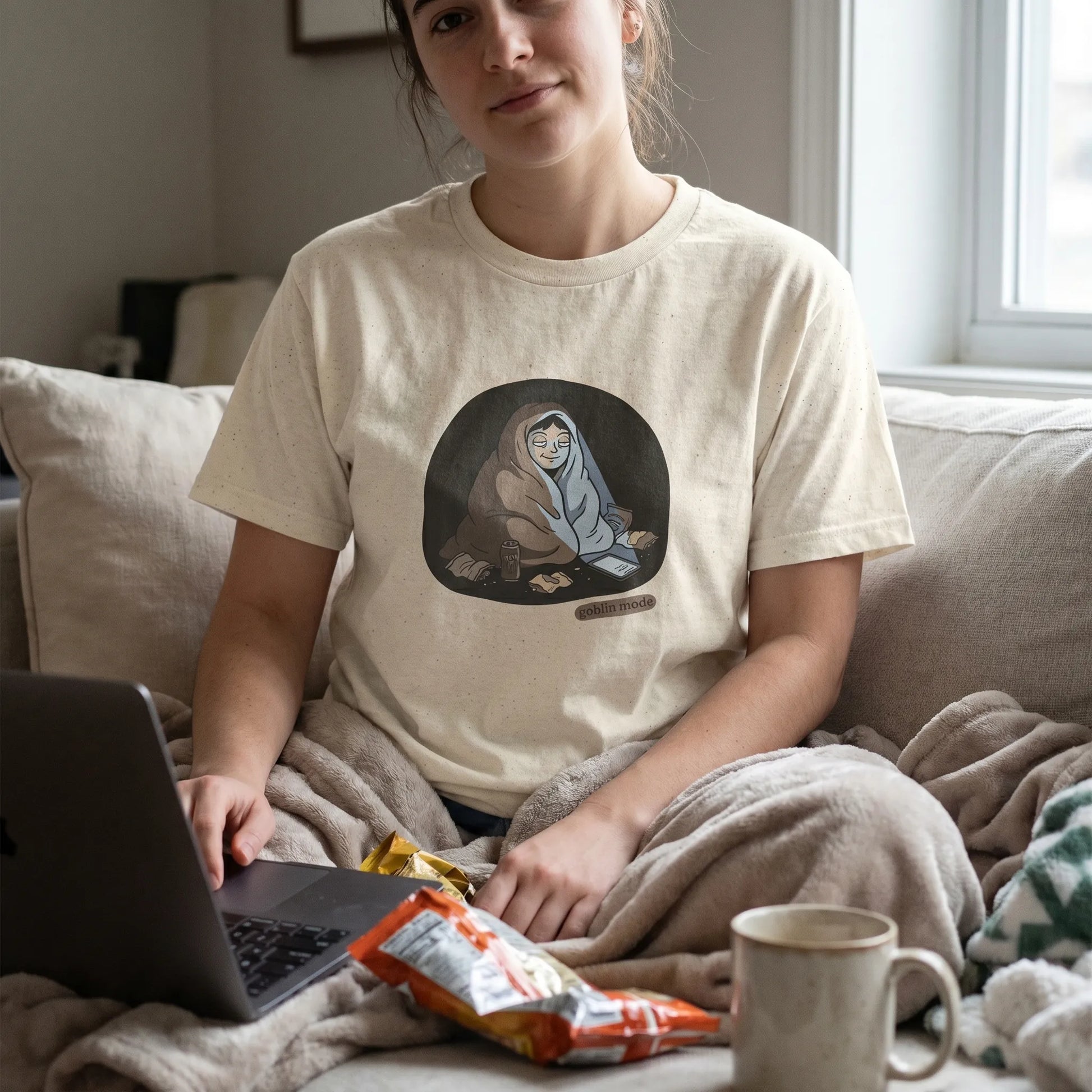 Lifestyle photo of a person wearing the Goblin Mode Tee, a funny cozy meme gift for the burnout friend featuring goblin energy and anti that girl vibes for lazy day humor while going goblin mode.