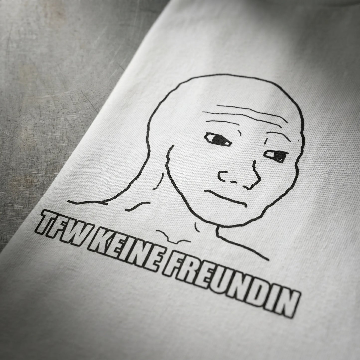 Close-up detail of the Impact meme all-caps caption on this made-to-order frontal bust print, a tfw no gf funny gift and wojak meme gift for him in sizes S-5XL with fast delivery and ships worldwide.