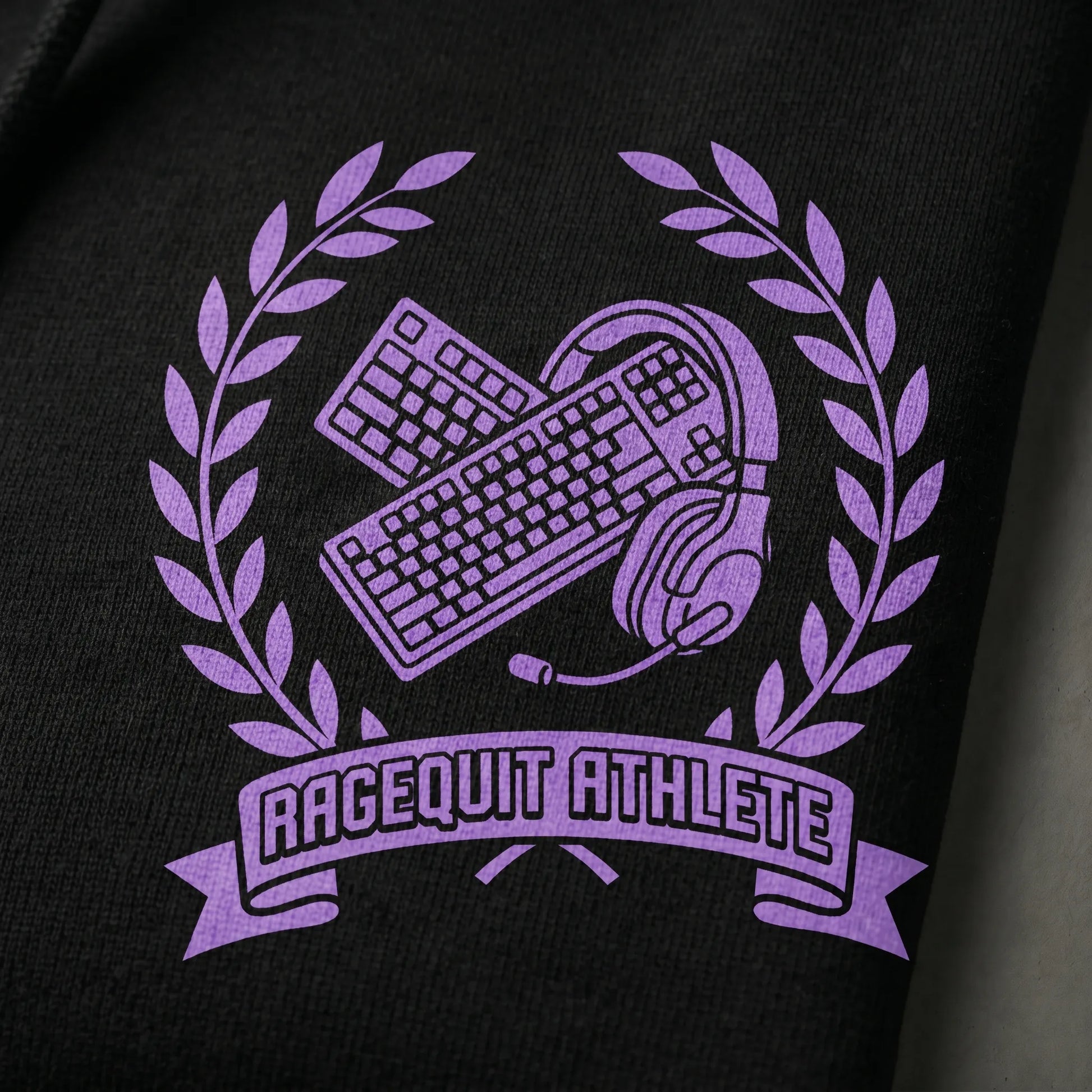 Close-up detail of the soft-hand DTG print on the 8.0oz cotton-poly blend Mogged Ragequit Olympics Hoodie, highlighting the viral on Twitch spring 2026 mog off streamer meme tee graphic, sizes S-5XL.