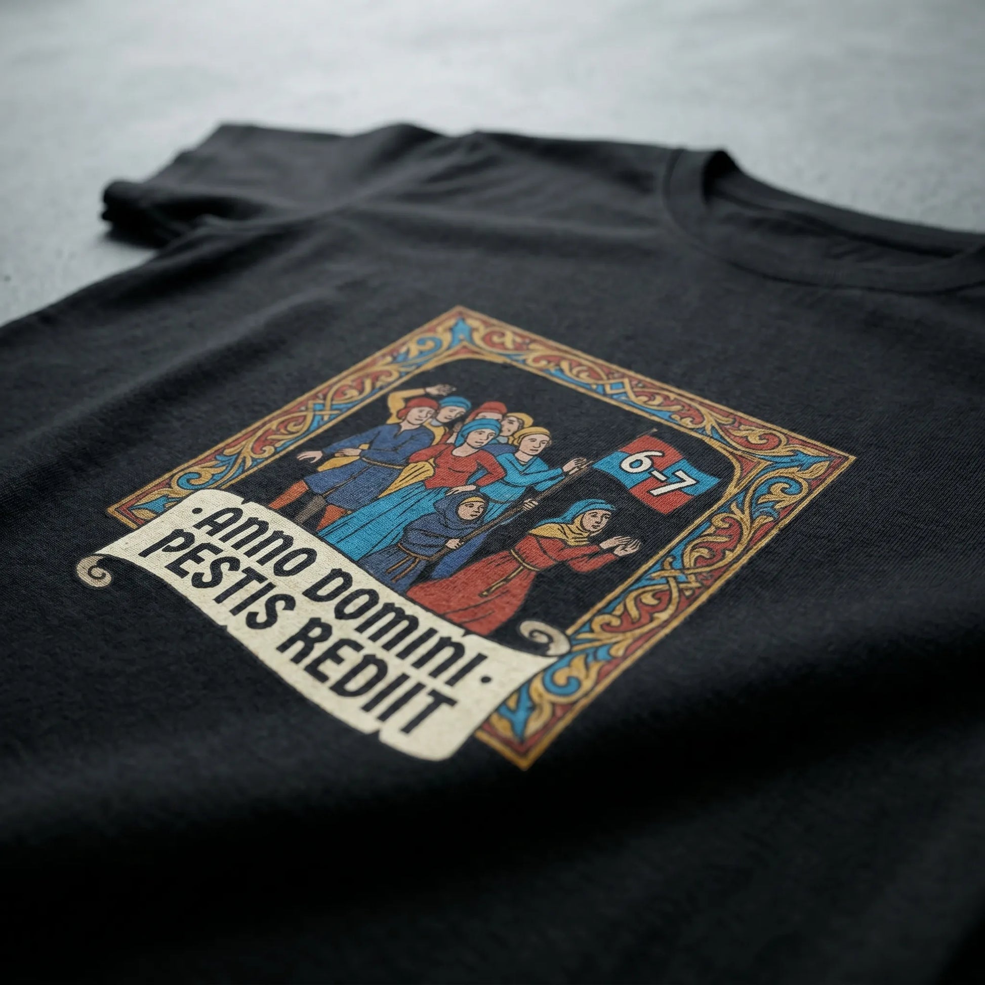 Close-up detail of the DTG soft-hand print on the Six Seven Meme Tee, highlighting the small 6-7 banner and medieval art texture on 5.3 oz cotton fabric available in S-5XL.