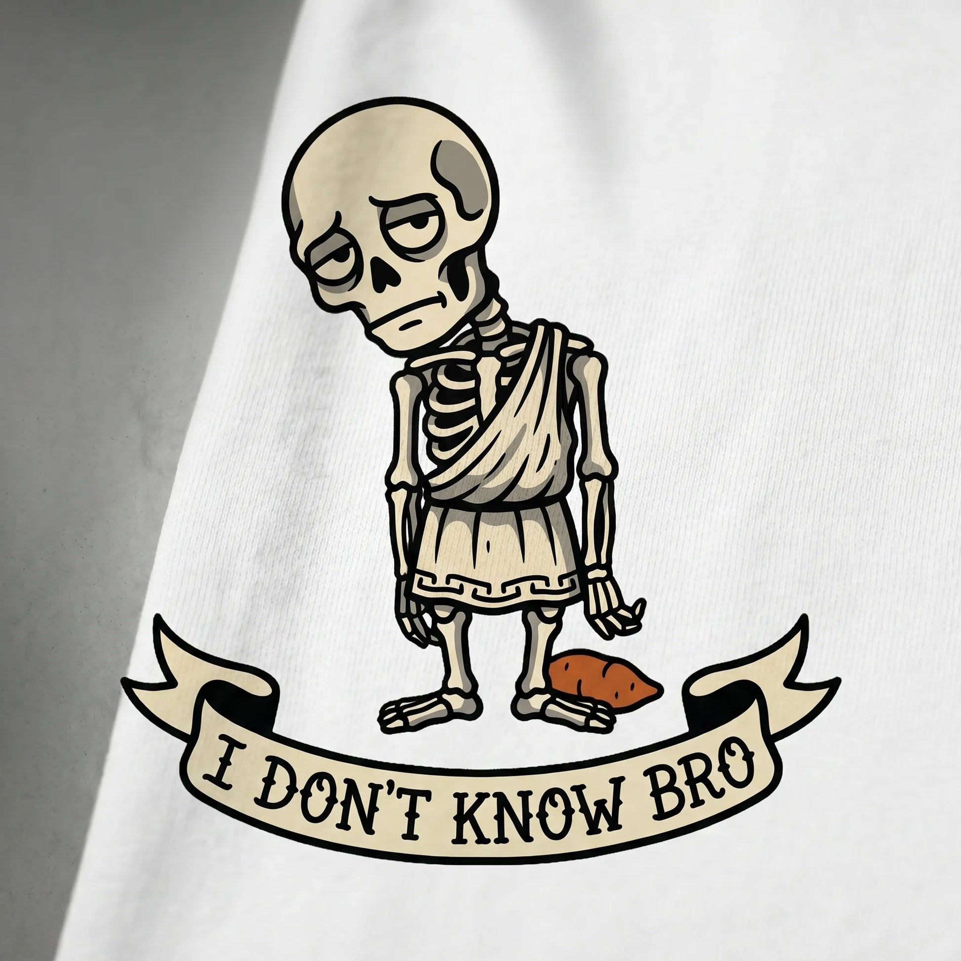 Close-up detail of the Socrates Skeleton in a classical toga, showcasing the soft-hand DTG print on 100% heavyweight cotton fabric, a funny philosophy meme gift that won't crack.